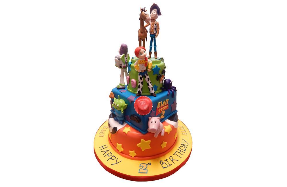 Toy story cake for my nephews 2nd birthday. My second time ever using  fondant. It's not perfect but I'm super proud of it. : r/cakedecorating