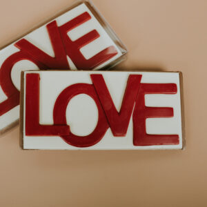 Large milk chocolate bar with white chocolate LOVE topper